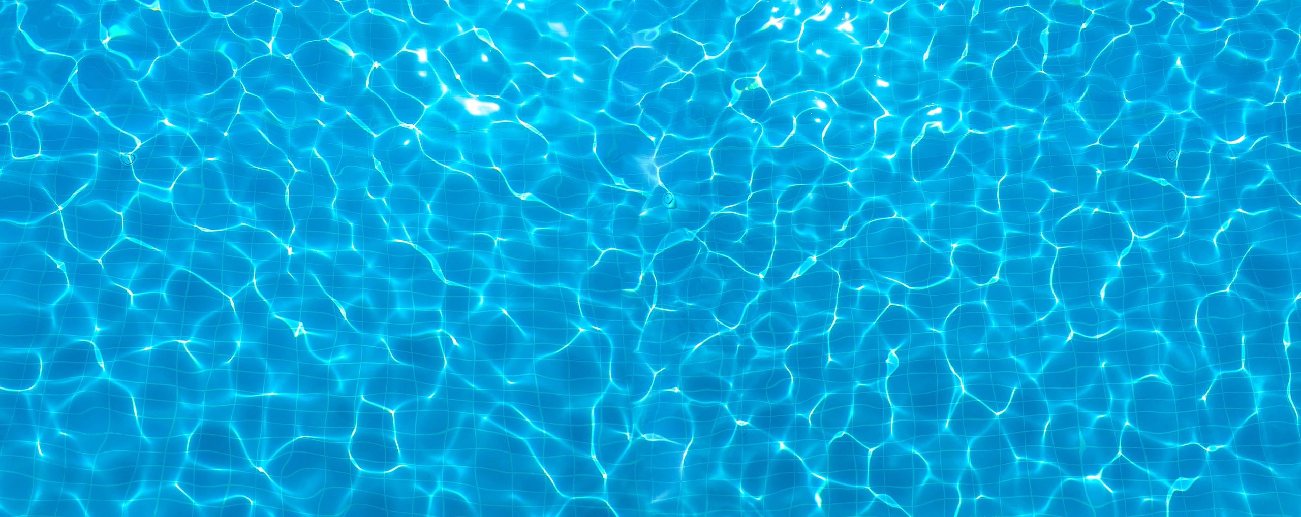 Close-up of sparkling pool water surface